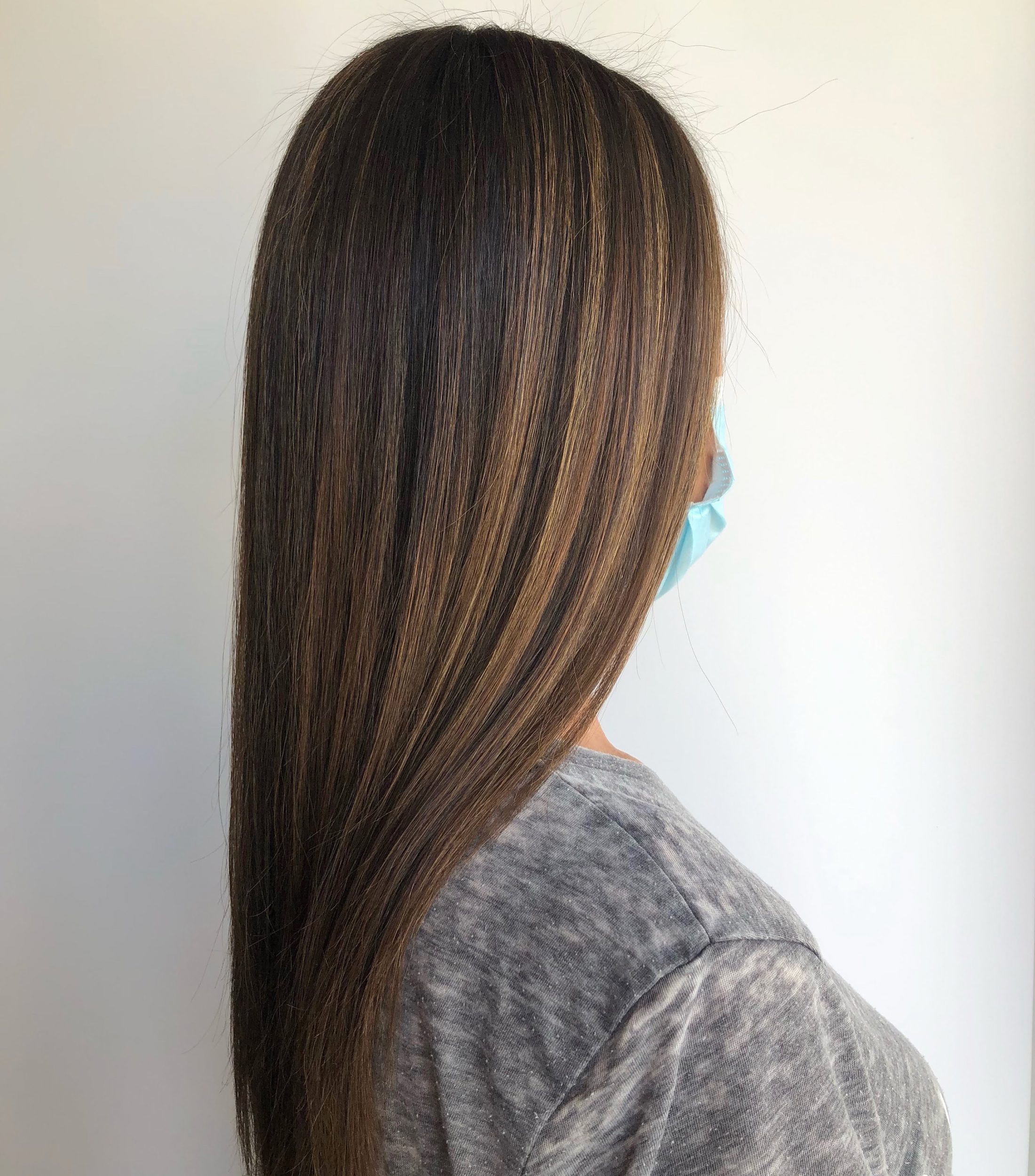 Long brunette with highlights.